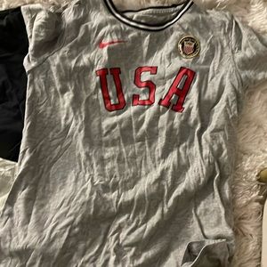 Variety of Boys medium shirts and sweatpants.